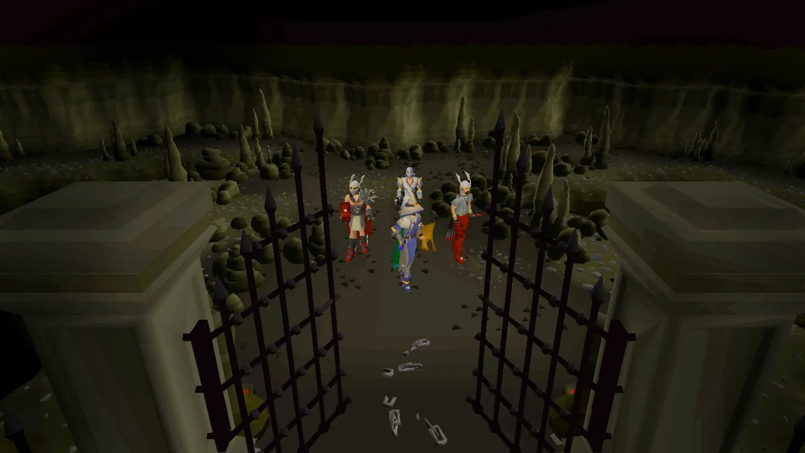 Drei Figuren vor einem offenen Eisengitter in einer Höhle, Old School RuneScape